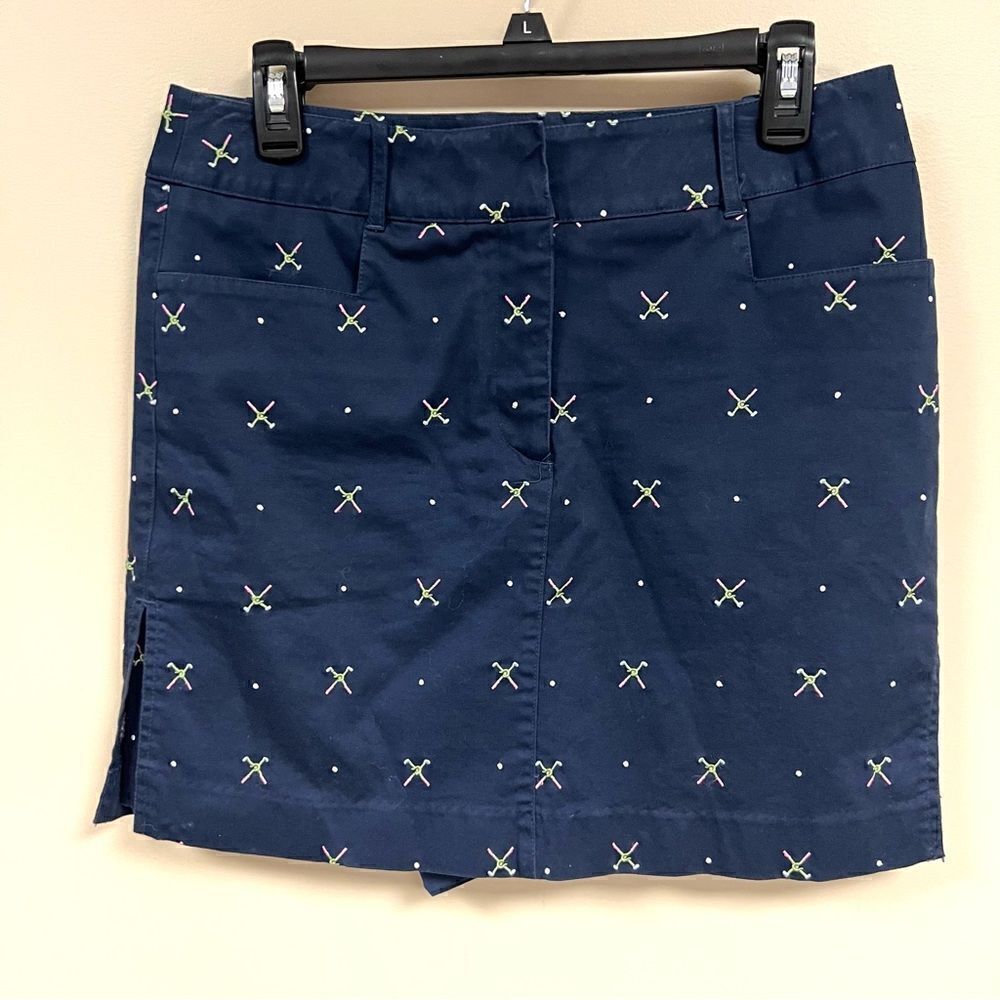 - IZOD embroidered navy golf skirt.  Size 8